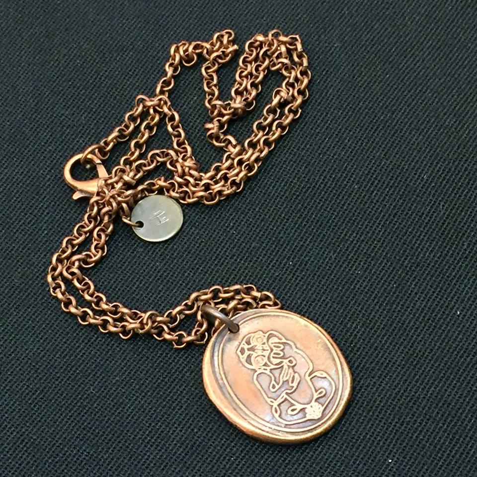 Copper Tiki necklace